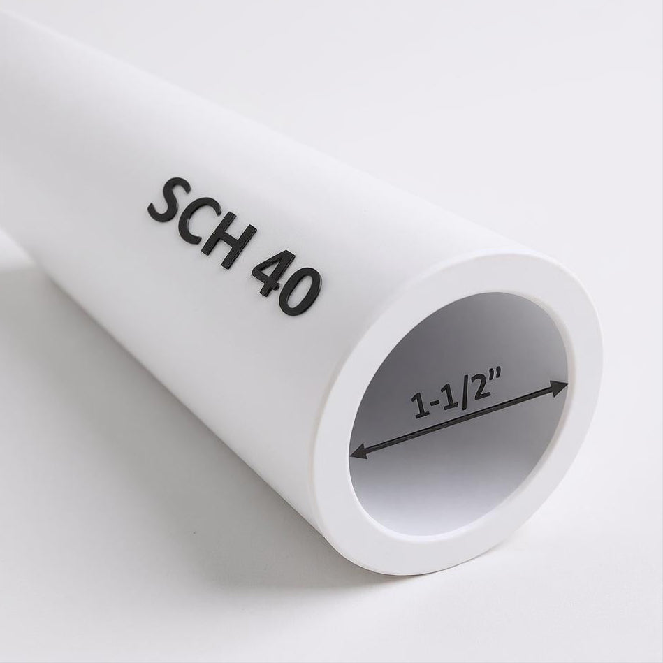 1-1/2" Schedule 40 PVC pipe – side view showing smooth white finish and cut-to-length ends for plumbing and irrigation use